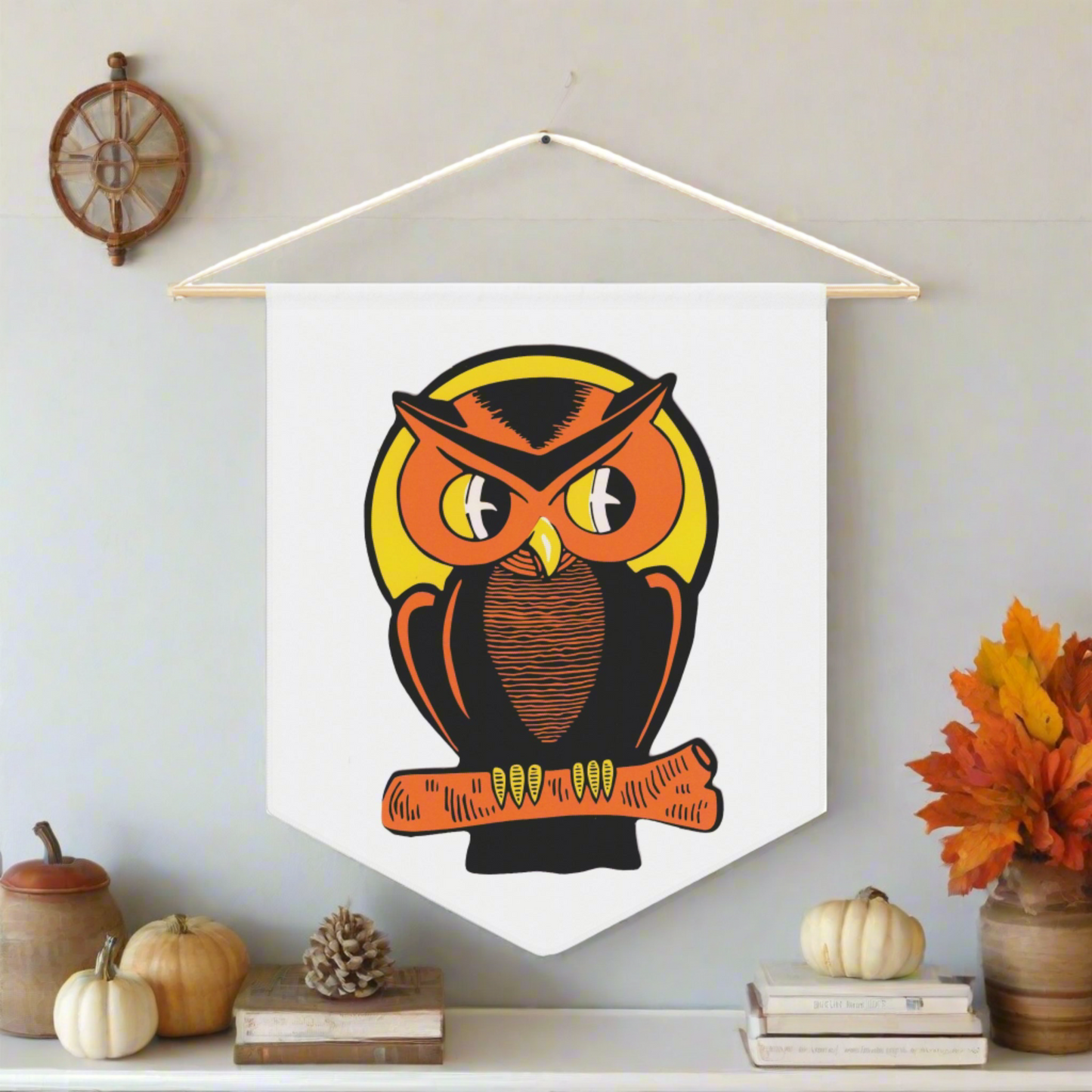 This pennant banner flag wall hanging features a vintage Halloween illustration of a beautiful Orange and black owl perched on a branch with the full yellow moon behind him. 