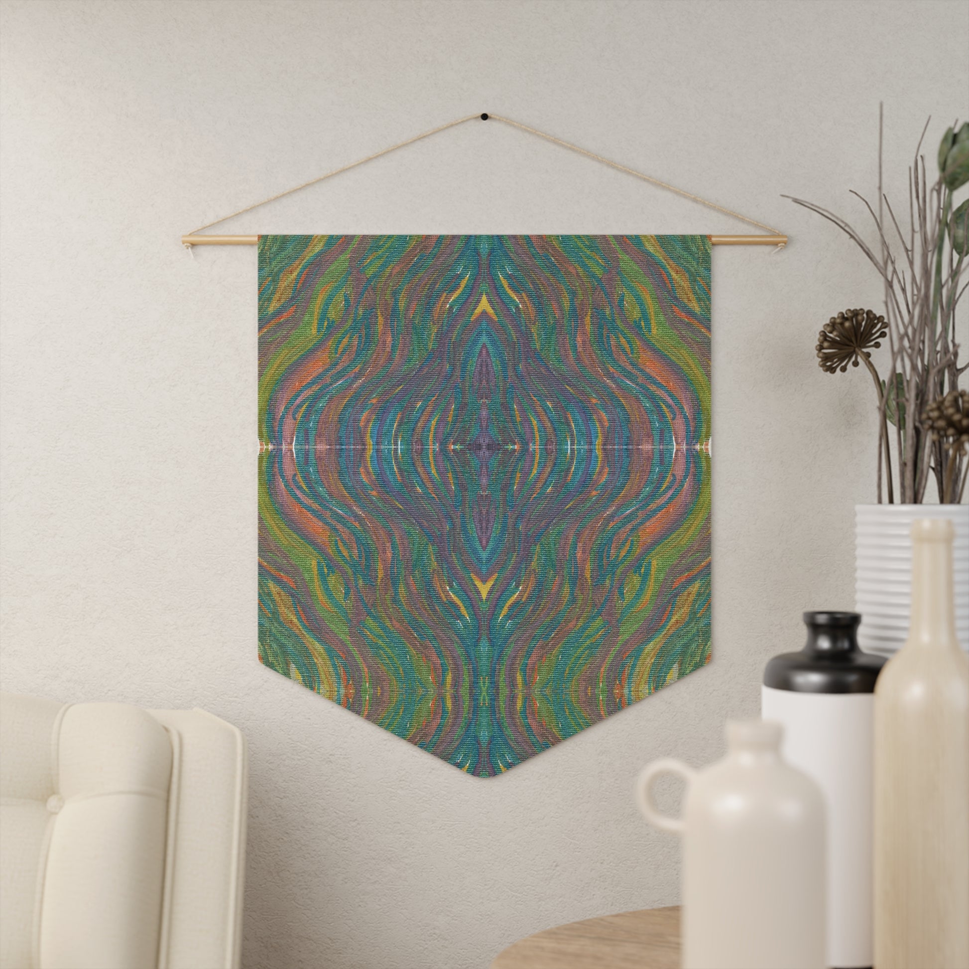 This fabric wall hanging by Caden Caraco features swirls of greens, yellows, blues, purples all blended.