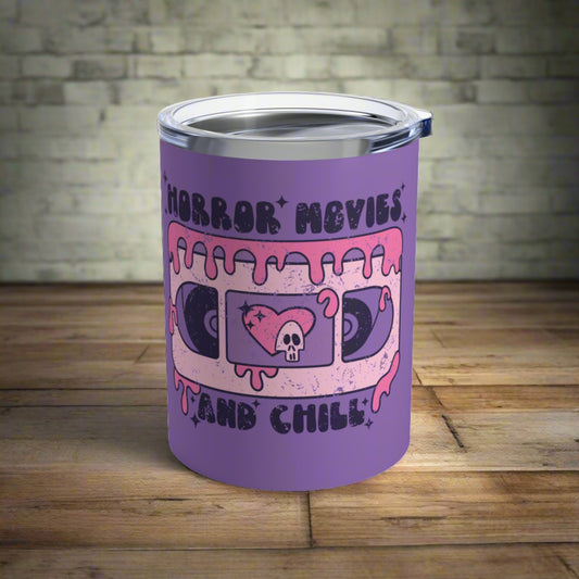 This 10 ounce purple stainless steel travel mug features distressed retro artwork that says Horror Movies and Chill. It features a pink VHS tape with a cute heart and skeleton in the middle.