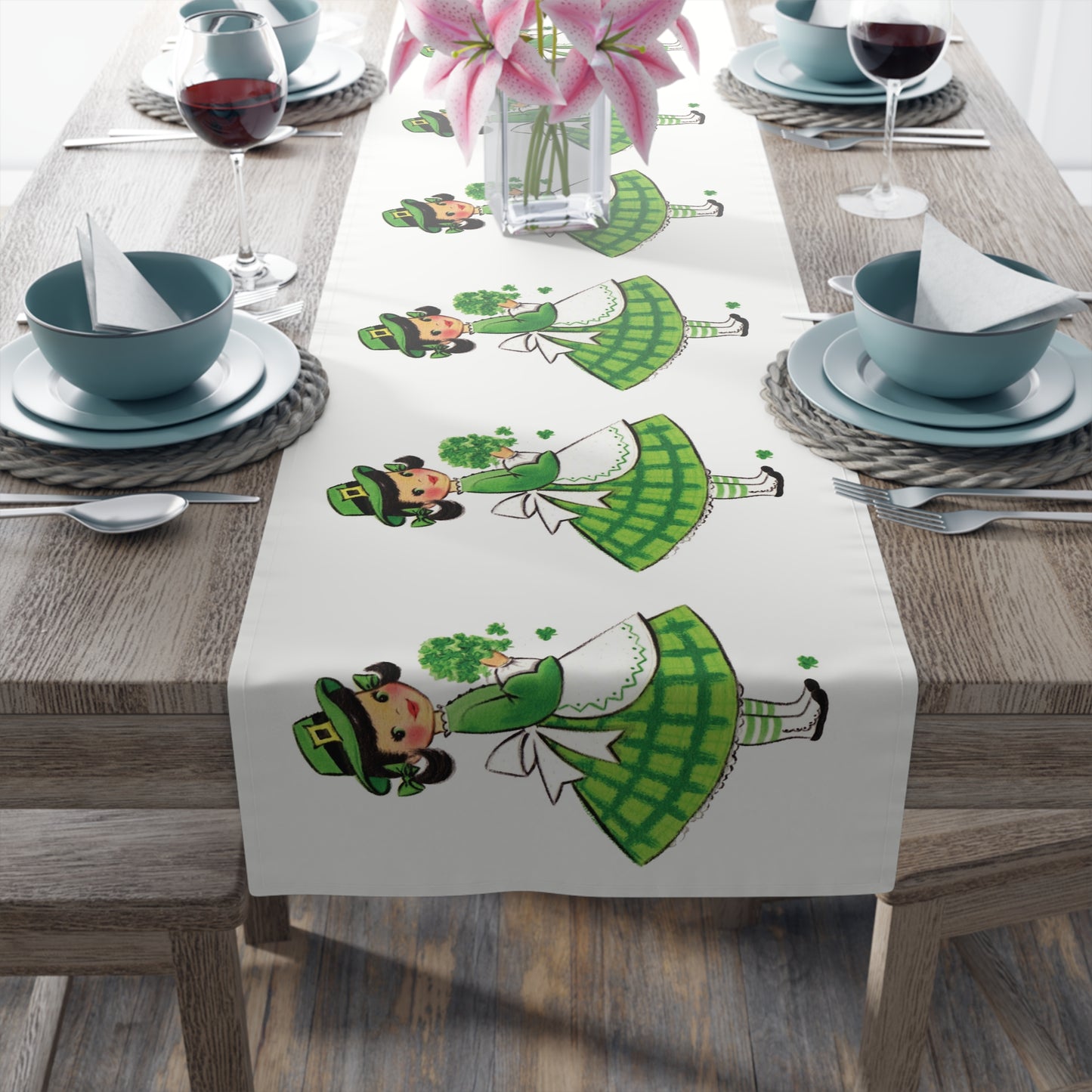 This table runner features a retro midcentury St. Patrick&#39;s Day illustration of a girl dressed in green, wearing a hat and holding shamrocks.