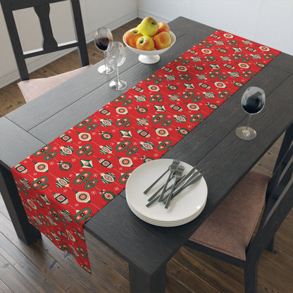 This red table runnner features retro style atomic era Christmas Ornaments.