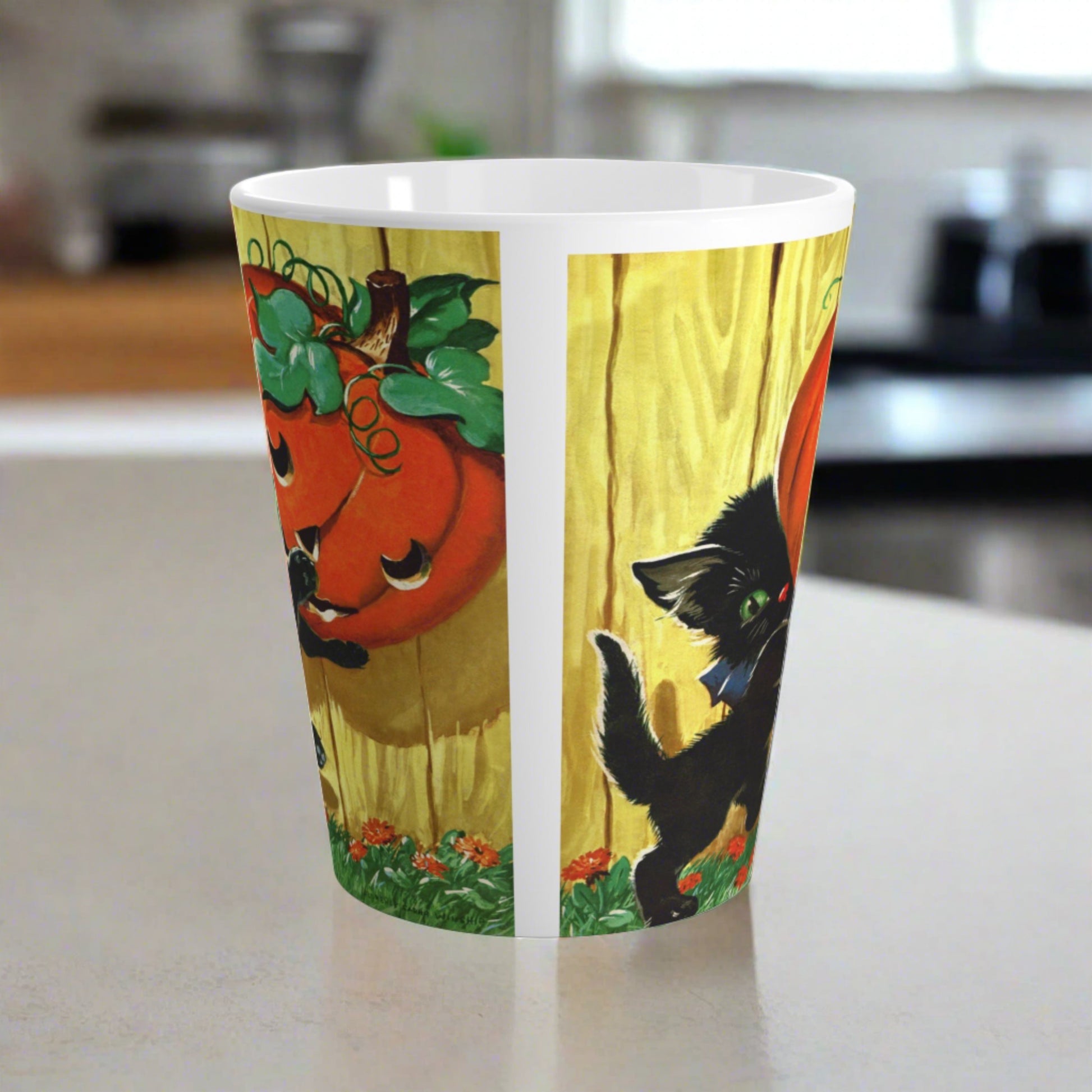 This glossy ceramic latte mug features a vintage Halloween illustration featuring a black kitty carrying a Jack 'o Lantern.