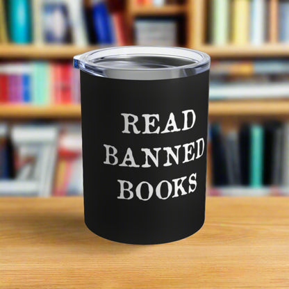 This 10 ounce black tumbler travel mug features white lettering that says Read Banned Books.