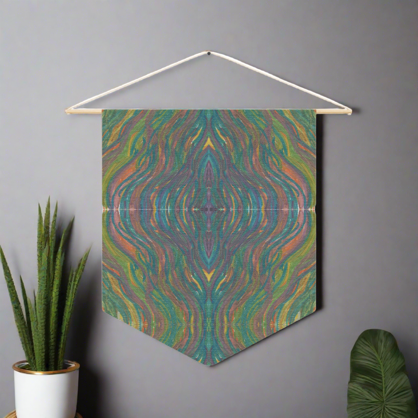 This fabric wall hanging by Caden Caraco features swirls of greens, yellows, blues, purples all blended.