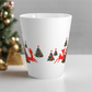 This ceramic glossy latte coffee mug features a midcentury retro illustration of red reindeer and green christmas trees with red ornaments.