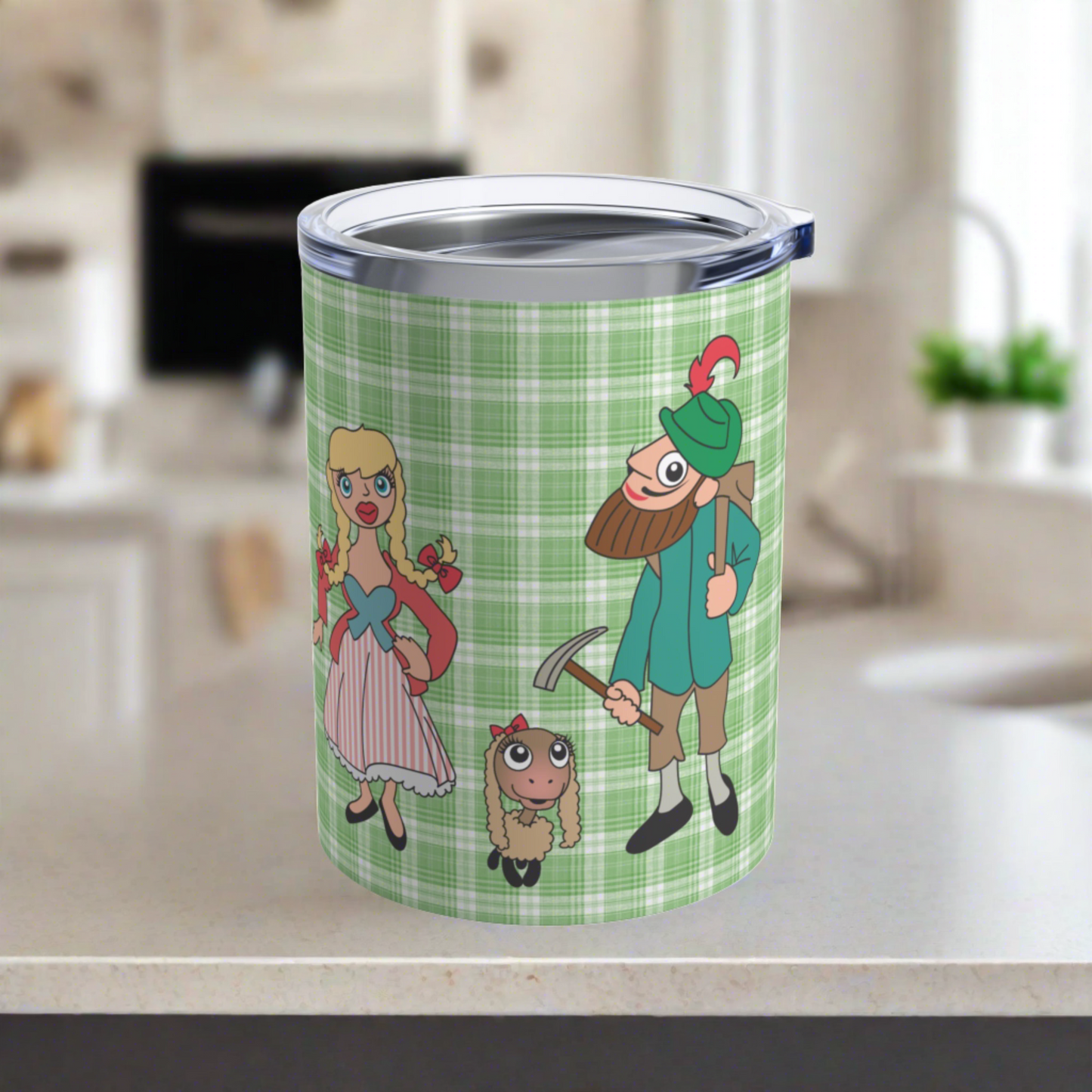 This 10 ounce travel tumbler mug features characters from the Sound of Music Lonely Goatherd song: The Goatherd, the girl in the pale pink coat, and the baby goat. The background is green plaid. The mug comes with a plastic sipping lid.