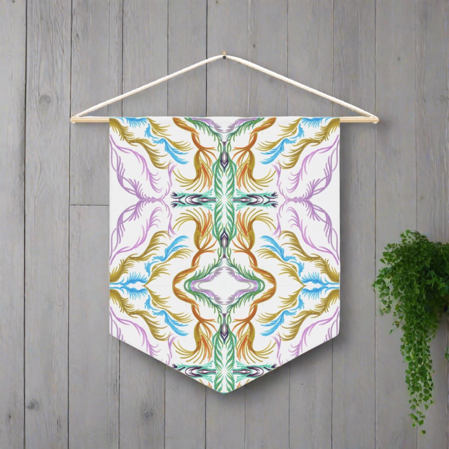 This fabric pennant wall hanging features the modern artwork of Caden Caraco. It features swirls of purple, greens and gold, inspired by Lyra and the memory of the universe. 