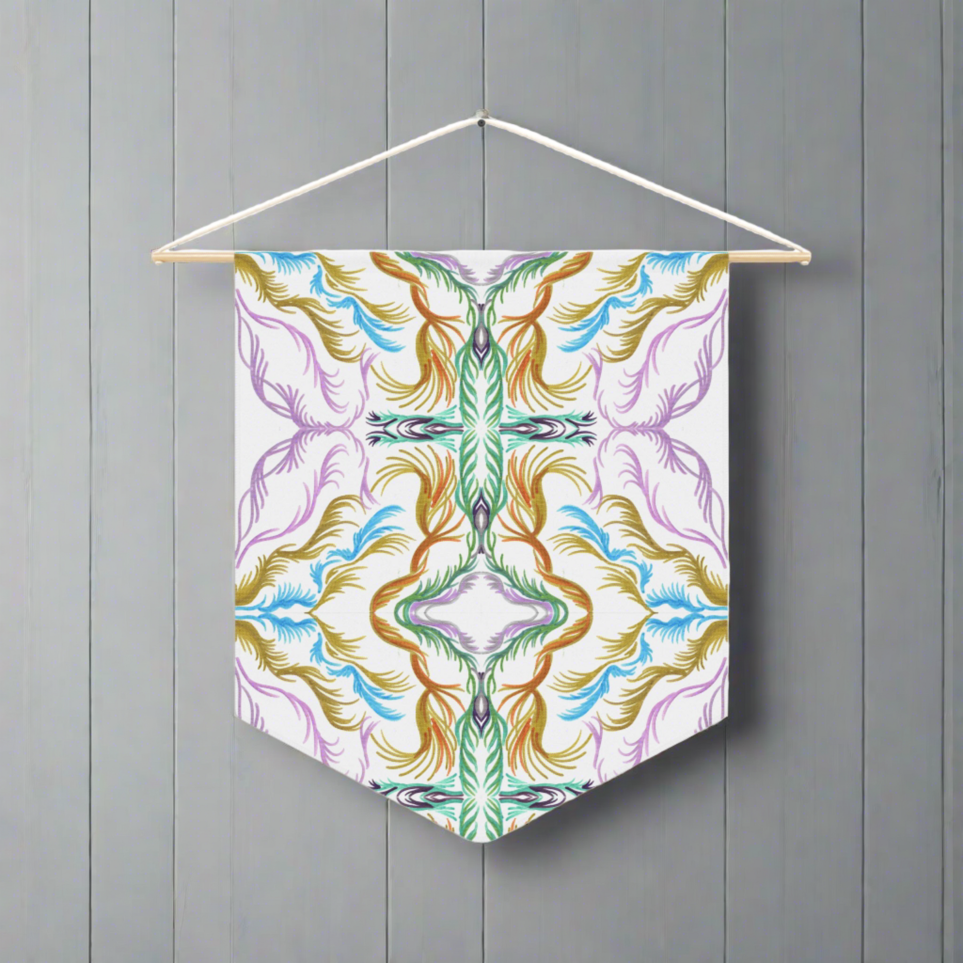 This fabric pennant wall hanging features the modern artwork of Caden Caraco. It features swirls of purple, greens and gold, inspired by Lyra and the memory of the universe. 