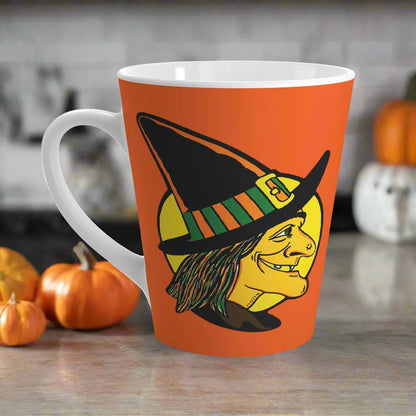 This 12 ounce ceramic latte coffee mug features a midcentury retro Halloween print of a profile of a witch with a full yellow moon behind her.