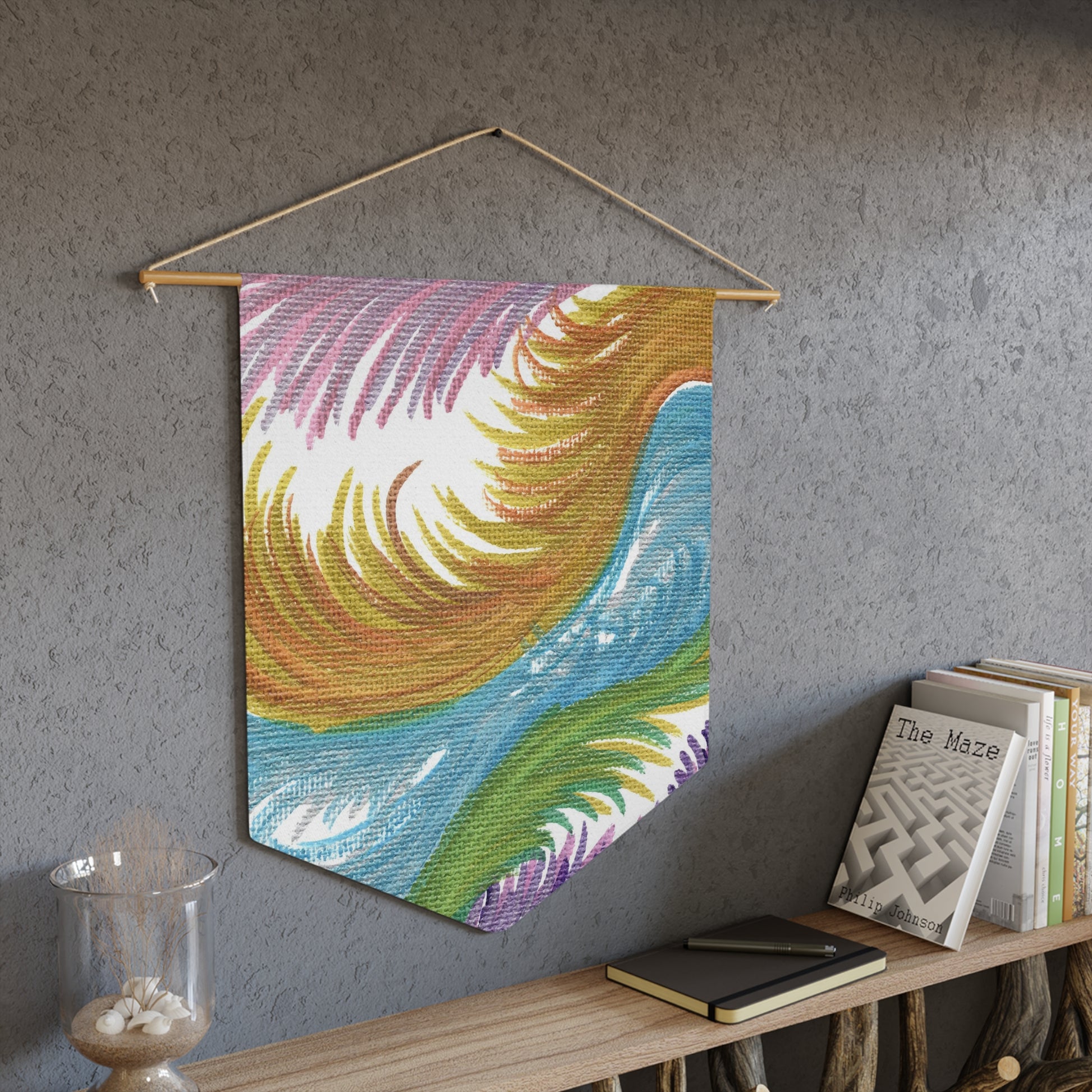 This fabric wall hanging features ethereal space swirls of pinks, blues, greens and gold.