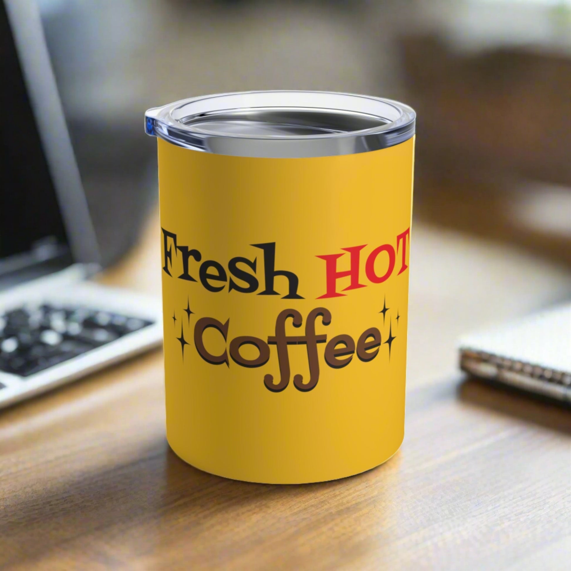 This yellow 10 ounce stainless steel vacuum insulated tumbler features an atomic era retro style design that says Fresh HOT Coffee with little starbursts.