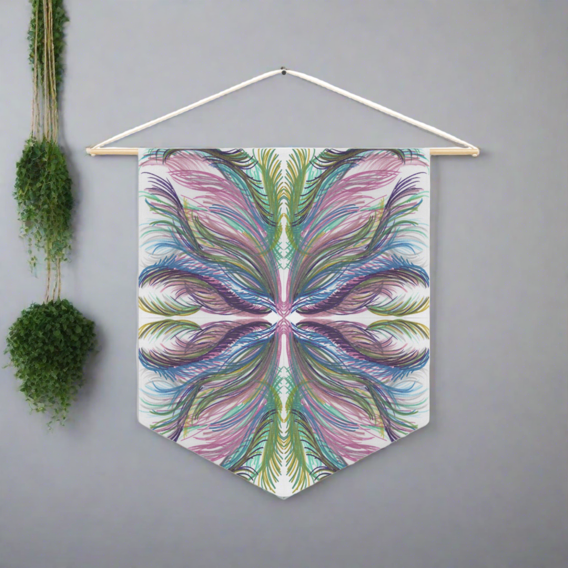 This fabric wall hanging features greens, blues, and purples inspired by the palm leaves of celestial Lyra. Artwork is by Caden Caraco. 