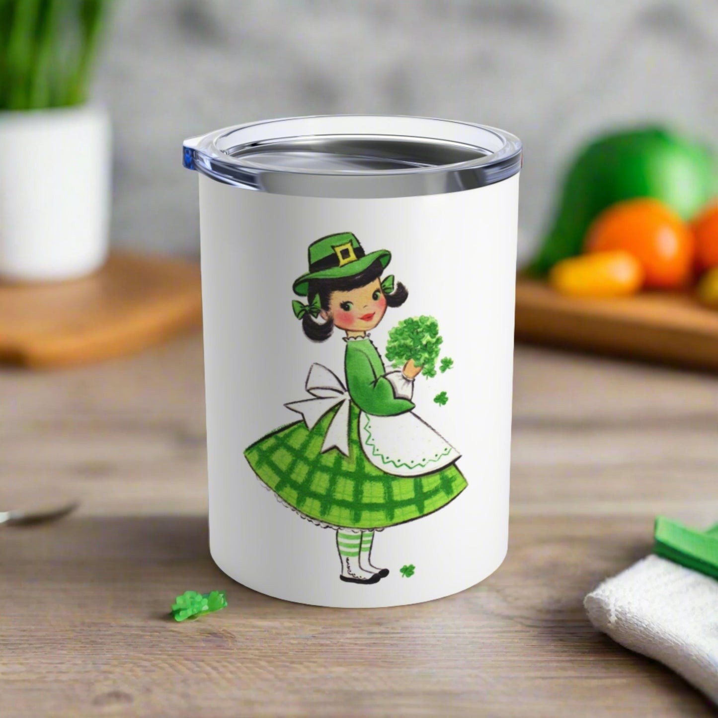 This 10 ounce stainless steel travel mug tumbler features a midcentury retro St. Patrick's Day illustration of an Irish girl holding a bouquet of shamrocks. 