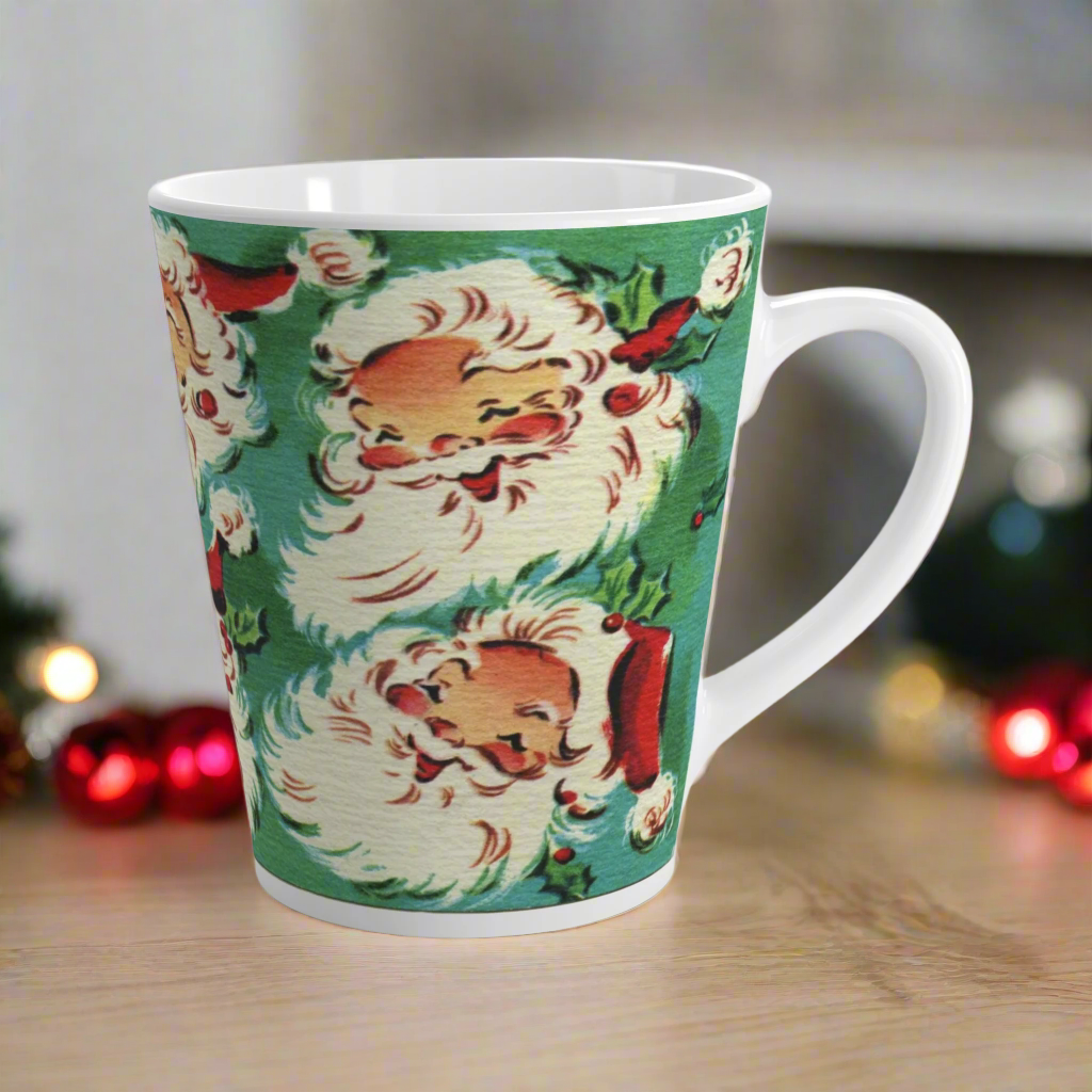 This ceramic glossy latte Christmas mug features a vintage Midcentury illustration of six laughing santas with holly berries.