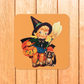 This glossy cork back coaster features an adorable retro Halloween illustration of a young witch holding a broom and jack o lantern with her brown cat sitting next to her.