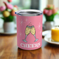 This 10 ounce pink stainless steel tumbler features two toasting champagne glasses with little bubbles. There is atomic era stars and lettering that says Cheers. It comes with a plastic sipping lid.