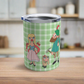 This 10 ounce travel tumbler mug features characters from the Sound of Music Lonely Goatherd song: The Goatherd, the girl in the pale pink coat, and the baby goat. The background is green plaid. The mug comes with a plastic sipping lid.