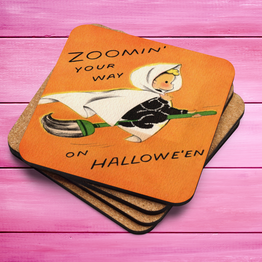 This orange glossy cork back coaster features a retro Halloween illustration that says Zoomin' Your Way On Halloween with an adorable witch flying on a broomstick.