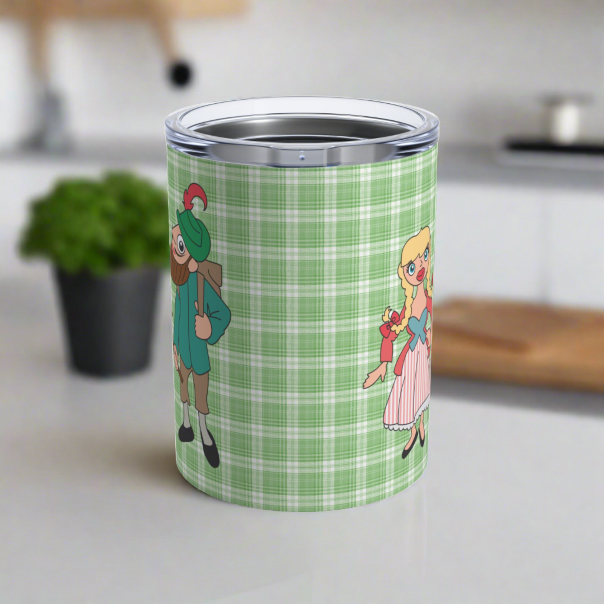 This 10 ounce travel tumbler mug features characters from the Sound of Music Lonely Goatherd song: The Goatherd, the girl in the pale pink coat, and the baby goat. The background is green plaid. The mug comes with a plastic sipping lid.