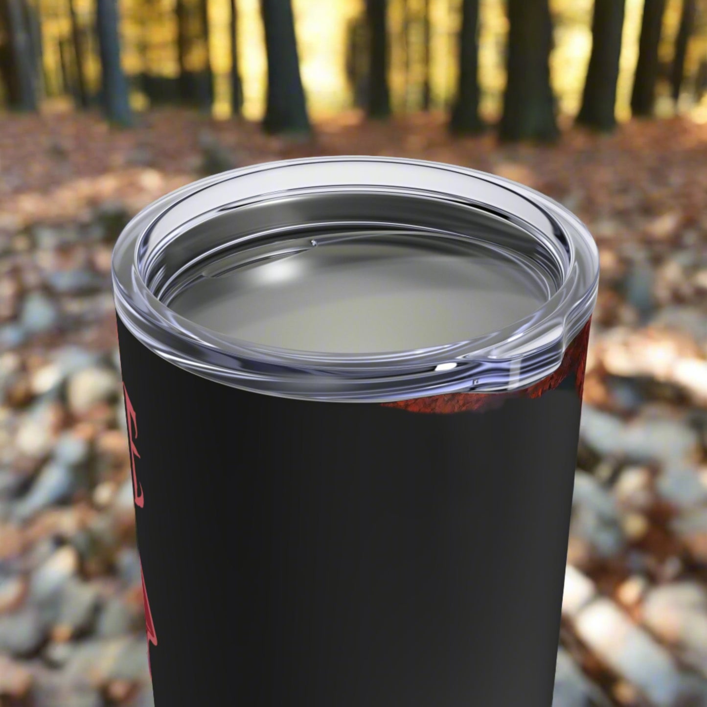 This 10 ounce stainless steel vacuum insulated black travel tumbler features vampire lips and fangs dripping with blood and the words Bite Me in Pink.