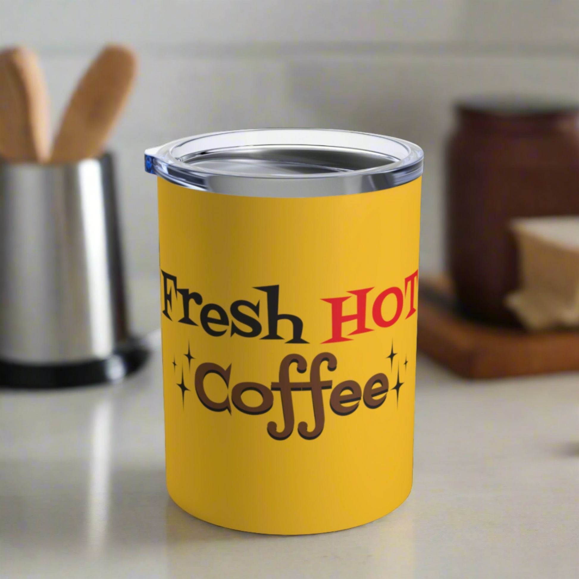 This yellow 10 ounce stainless steel vacuum insulated tumbler features an atomic era retro style design that says Fresh HOT Coffee with little starbursts.