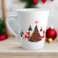 This ceramic glossy latte coffee mug features a midcentury retro illustration of red reindeer and green christmas trees with red ornaments.