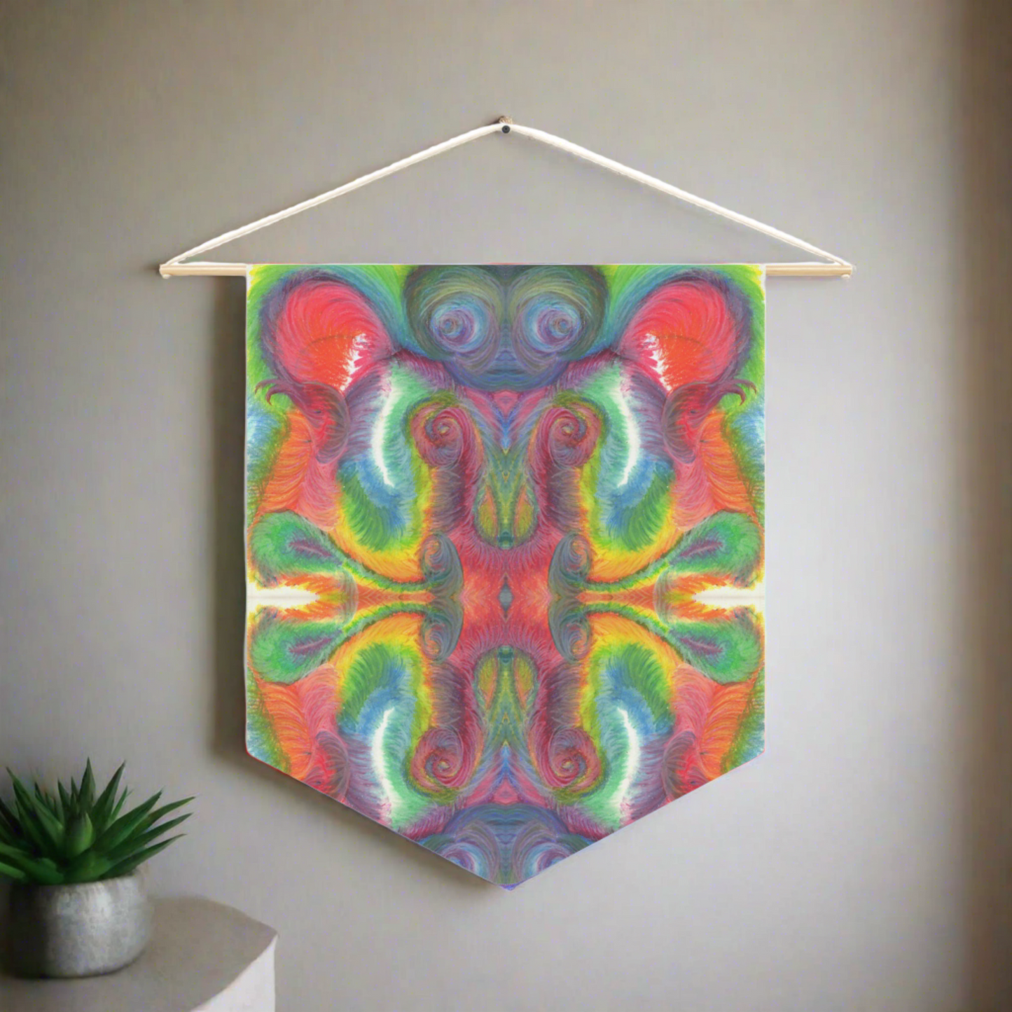 This fabric wall hanging features the hand drawn artwork of modern artist Caden Caraco. There are swirls of green, red, orange, yellows and purples. Original artwork is oil pastel on paper.