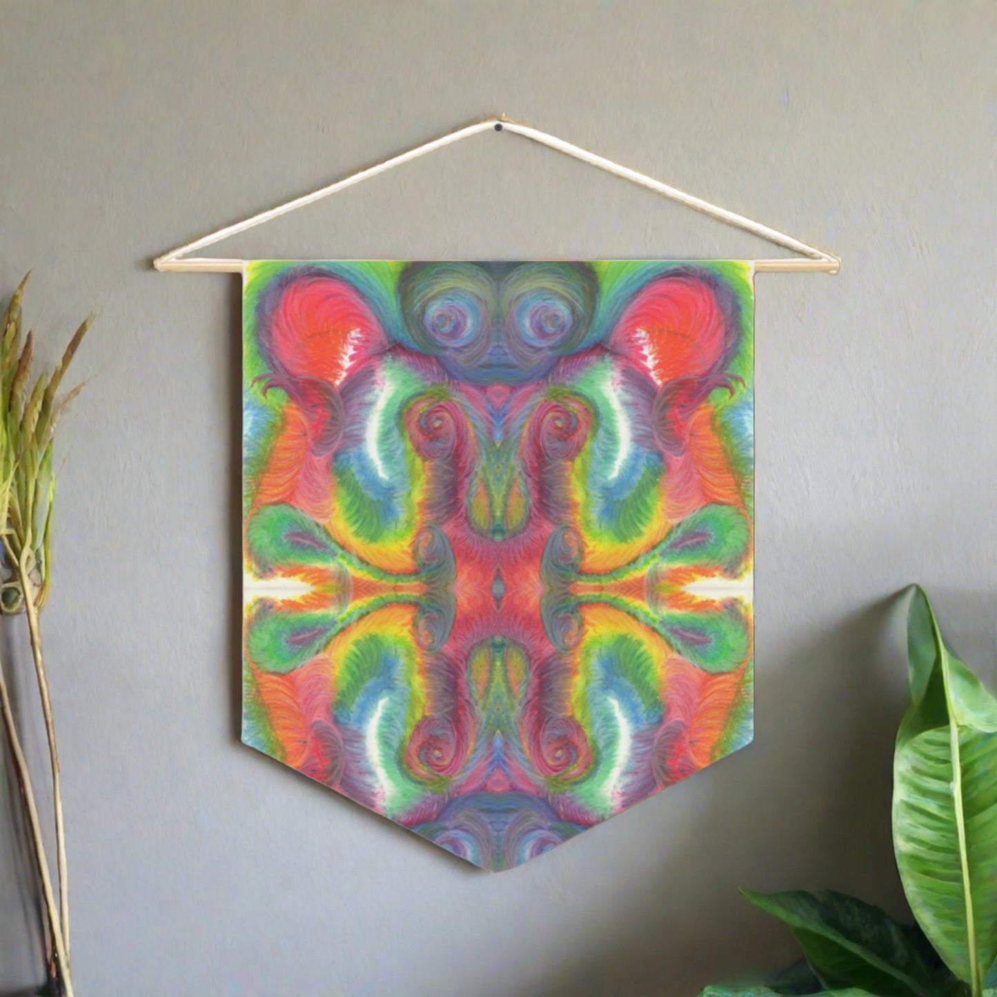 This fabric wall hanging features the hand drawn artwork of modern artist Caden Caraco. There are swirls of green, red, orange, yellows and purples. Original artwork is oil pastel on paper.