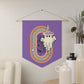 This purple pennant banner flag wall hanging features a retro boho pastel gothic style print of a ghost wearing a witch hat with a rainbow and spider web.