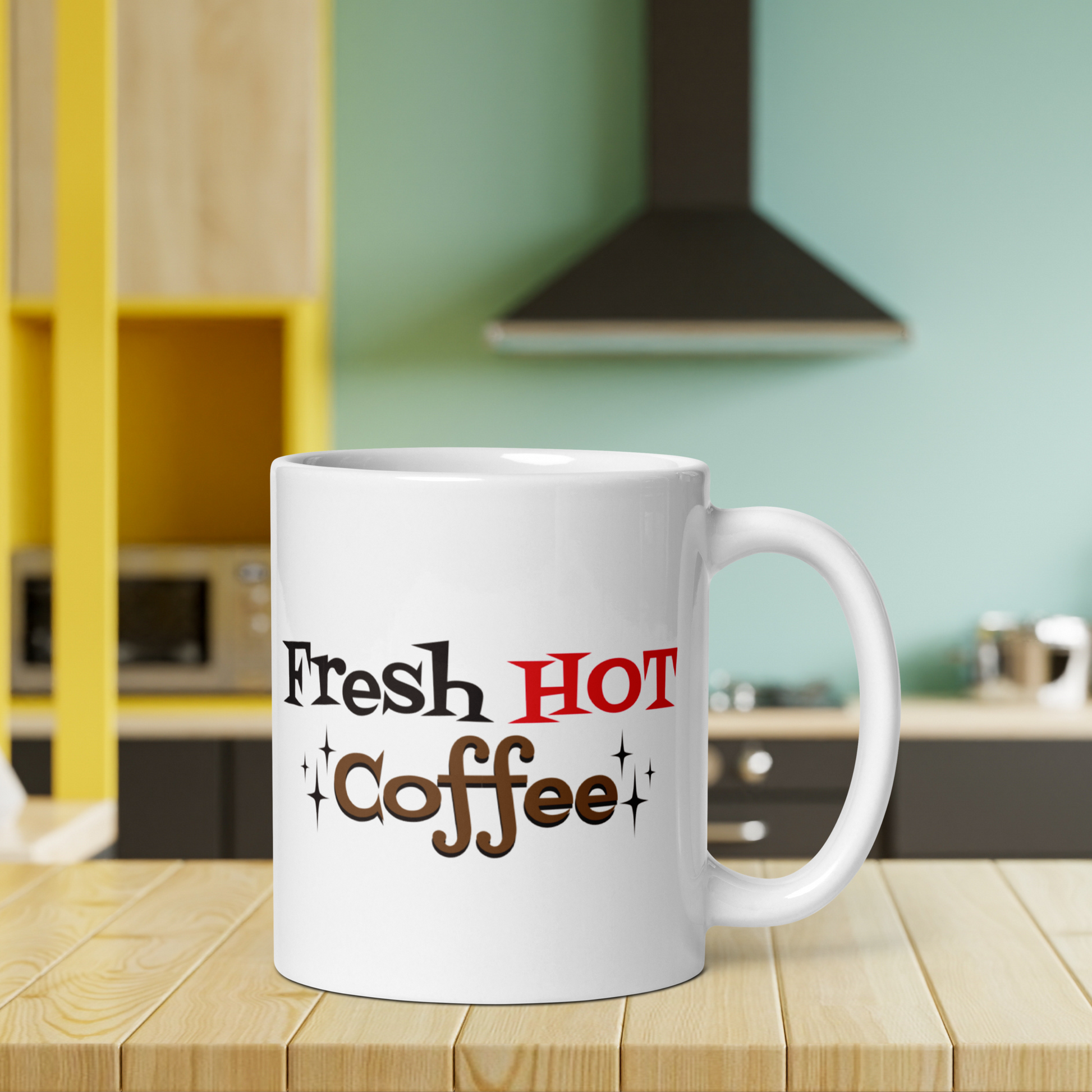 The ceramic white glossy mug features atomic era lettering that says Fresh HOT Coffee with starbursts around the word coffee. Fresh lettering is black, HOT is in red, and coffee is brown with a black shadowing.