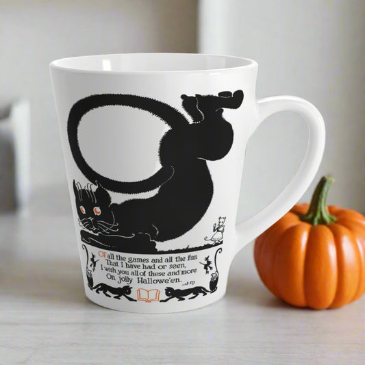 This 12 ounce glossy ceramic latte coffee mug features a vintage Halloween illustration of a black cat with a Halloween poem beneath him. There are smaller black cats, a book, owls and witches in the illustration as well.