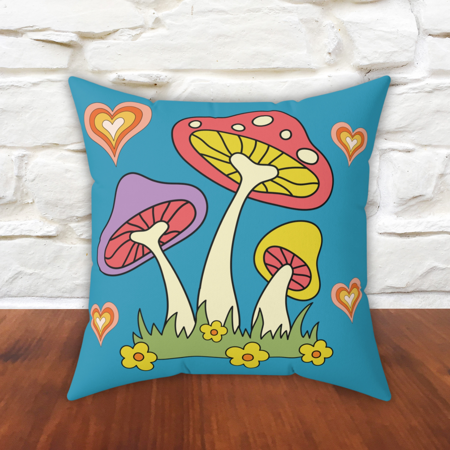 This polyester spun pillow features retro 70s style mushrooms, flowers and hearts with a vintage blue background.