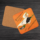 This orange glossy cork back coaster features a retro Halloween illustration that says Zoomin' Your Way On Halloween with an adorable witch flying on a broomstick.