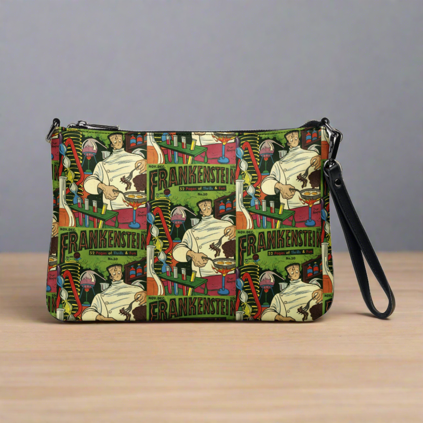 This Halloween crossbody purse features a vintage comic book cover featuring Frankenstein Monster in his laboratory.