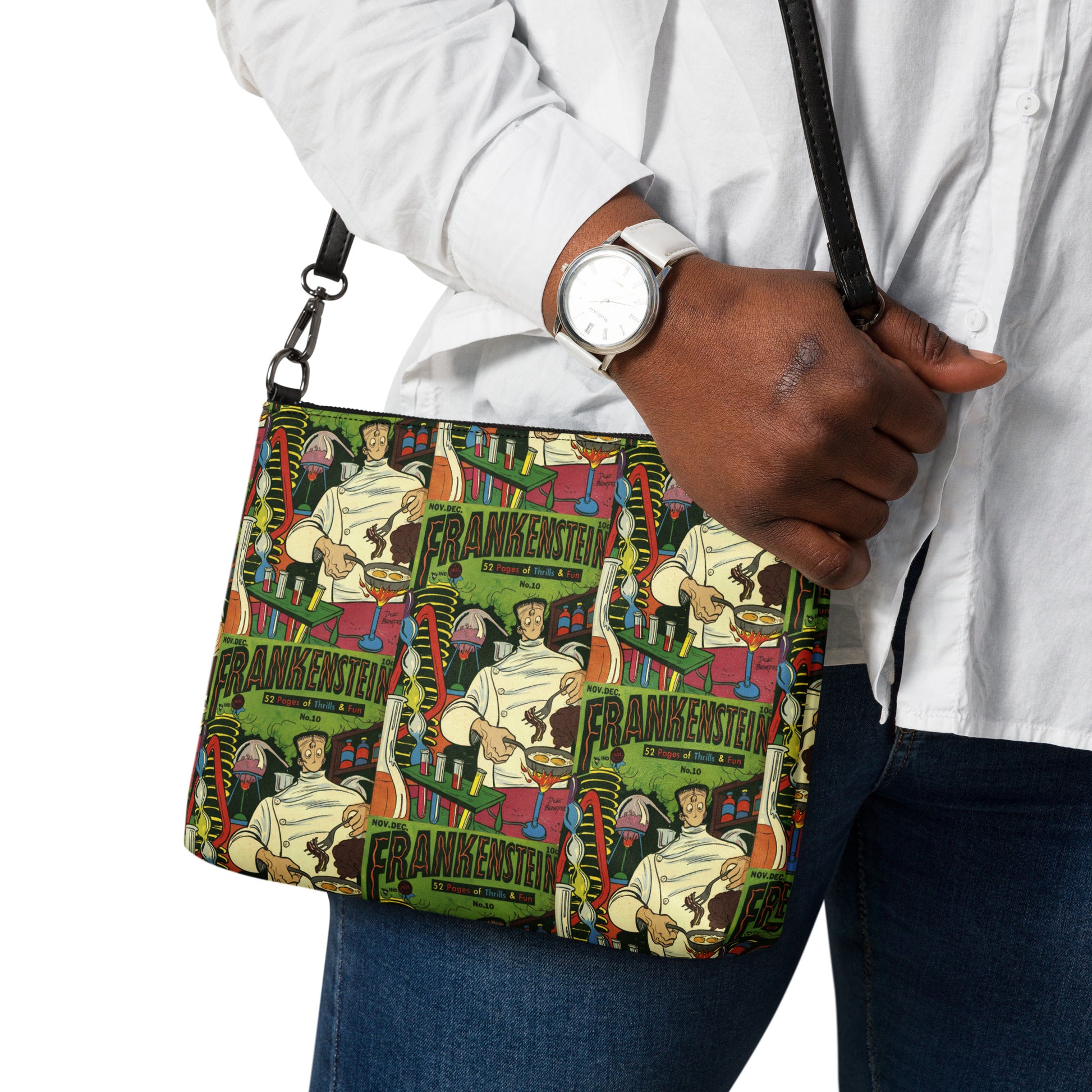 This Halloween crossbody purse features a vintage comic book cover featuring Frankenstein Monster in his laboratory.