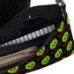 This black crossbody purse features a large red apple dipped in green poison with the words Bite Me underneath and the back is a small size in a patterned print.