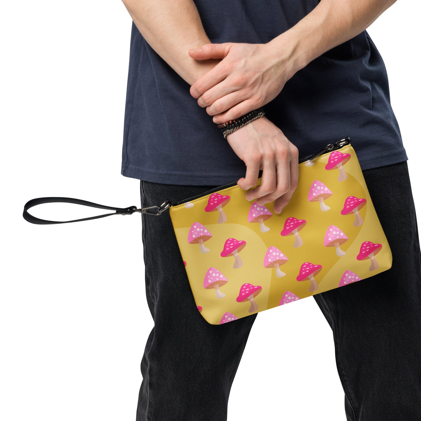 This yellow crossbody purse features the cute smoking caterpillar on one side and pink mushrooms on the other. It's a shoulder bag that converts into an oversized wristlet clutch.