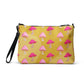 This yellow crossbody purse features the cute smoking caterpillar on one side and pink mushrooms on the other. It's a shoulder bag that converts into an oversized wristlet clutch.