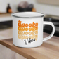 This 10 ounce enamel camping mug features a retro style font that says Spooky four times in various shades of orange with vibes in black.