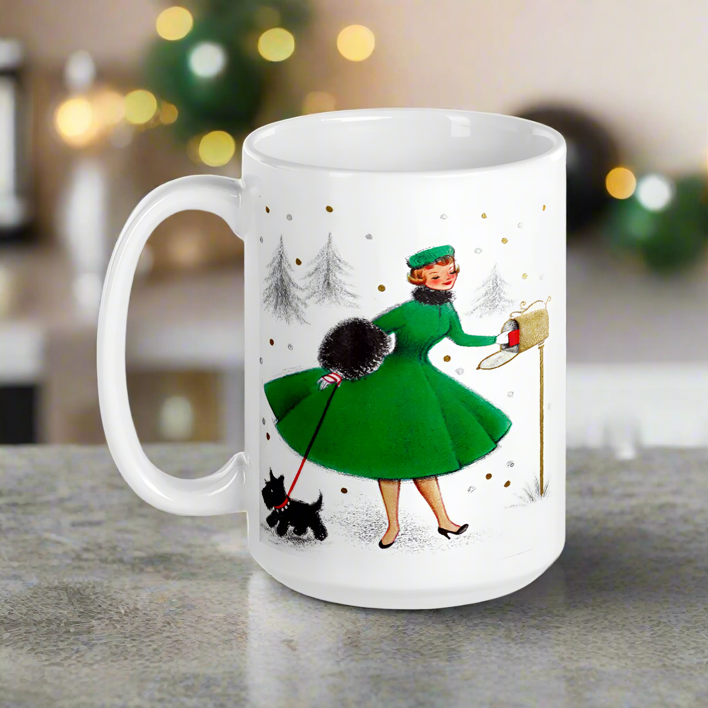 This ceramic glossy coffee mug features a midcentury retro Christmas illustration of a woman dressed in a green dress with a green hat, a black muff and red and white striped glove. She is walking her little black scottie and reaching into her mailbox. 