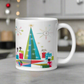 This ceramic glossy Christmas coffee mug features an atomic Midcentury illustration of cats peeking out from behind presents around a Christmas tree. There is a colorful round rug, light projector, clock and chandelier all in atomic era style.