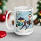 This glossy ceramic coffee cup features a retro woodland style Christmas winter illustration of a baby deer in the snow with a cute red and brown bird perched on her tail.