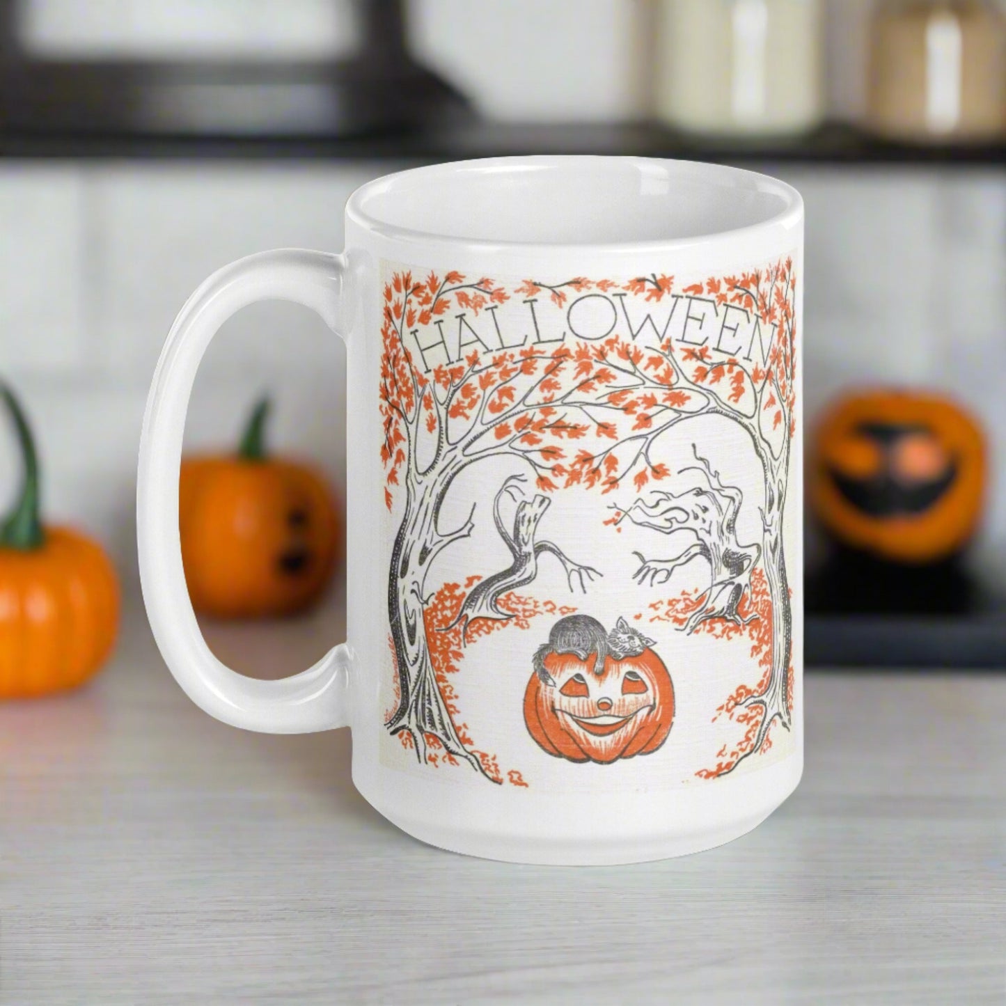 This glossy ceramic coffee mug features a retro vintage Halloween illustration that says Halloween with trees with spooky cute faces and orange leaves, with a jack o lantern in the middle and a black cat sleeping on the pumpkin.