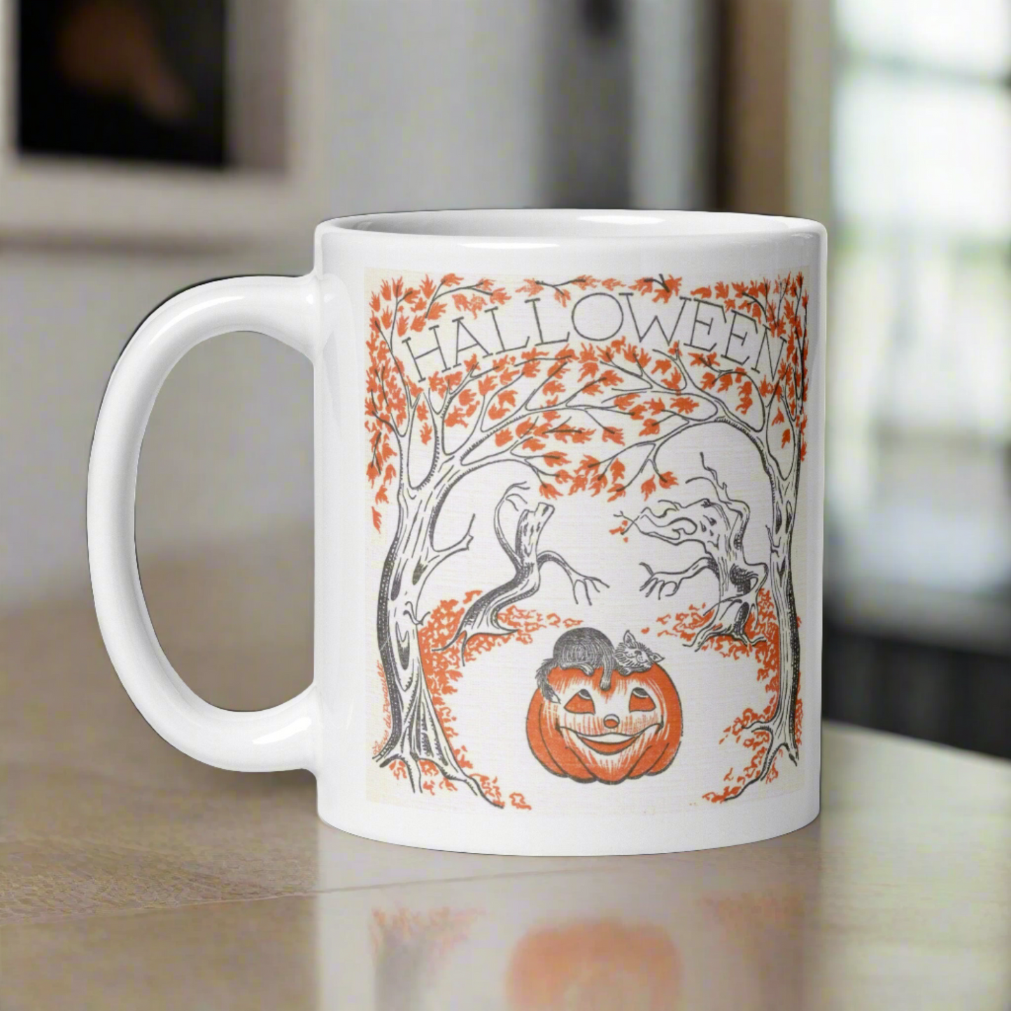 This glossy ceramic coffee mug features a retro vintage Halloween illustration that says Halloween with trees with spooky cute faces and orange leaves, with a jack o lantern in the middle and a black cat sleeping on the pumpkin.