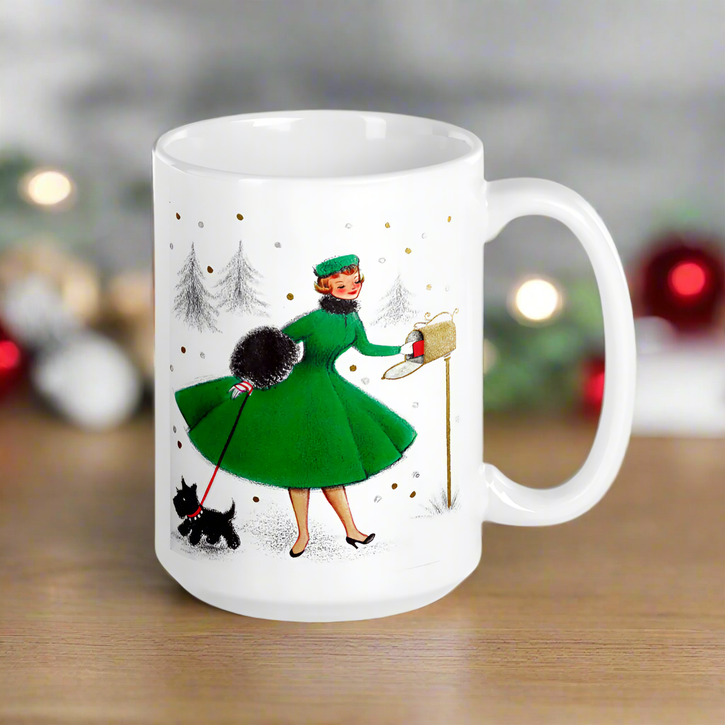 This ceramic glossy coffee mug features a midcentury retro Christmas illustration of a woman dressed in a green dress with a green hat, a black muff and red and white striped glove. She is walking her little black scottie and reaching into her mailbox. 