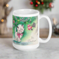 This ceramic glossy coffee mug features a midcentury vintage Christmas Illustration that says It's Christmas! There is an adorable white kitten wearing a pink bow underneath the christmas tree.