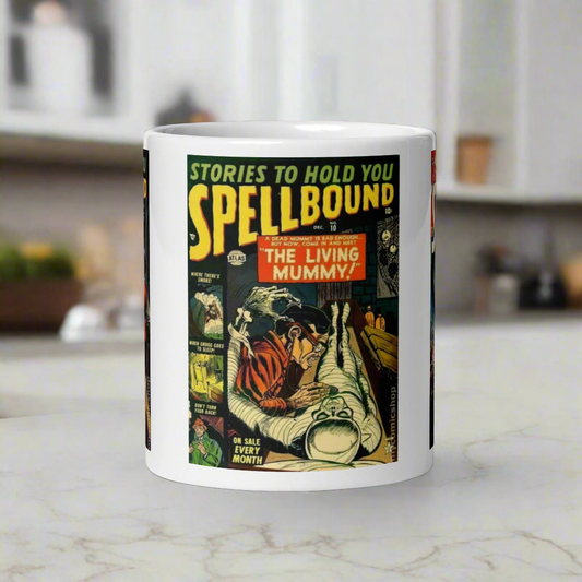 This ceramic glossy coffee mug features three covers from the vintage comic book Stories To Hold You Spellbound: My Friend The Ghost, The Living Mummy, and Almost Human,