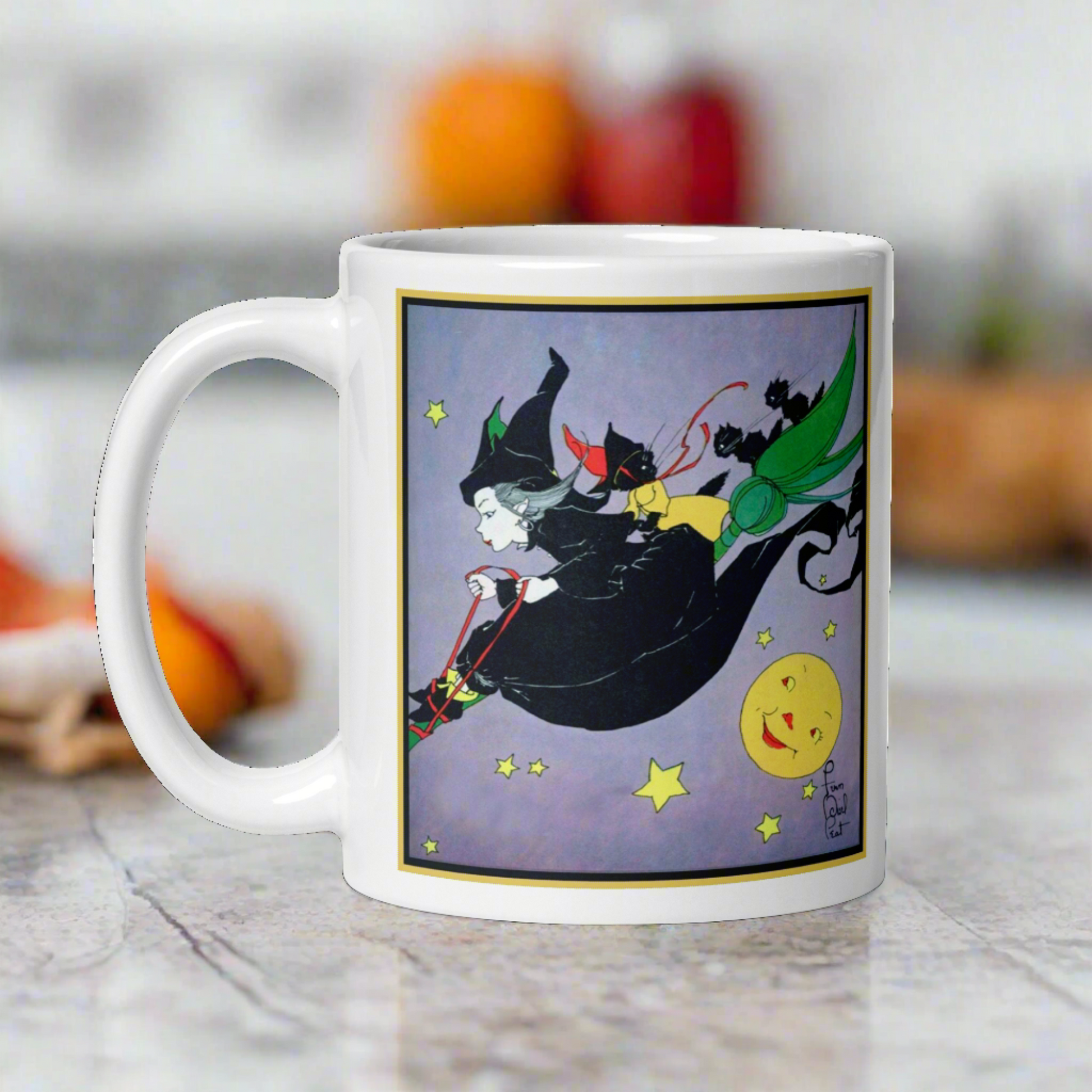 This ceramic glossy mug features a vintage Halloween illustration by Fern Bisel Peat. It features a witch dressed in all black soaring through the air on her broom with black cats. There is a smiling full yellow moon.