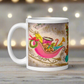 This ceramic glossy coffee mug features a midcentury Christmas illustration of Santa in a teal blue car convertible with a christmas tree in the back seat, the car is pulling his pink sleigh of presents.