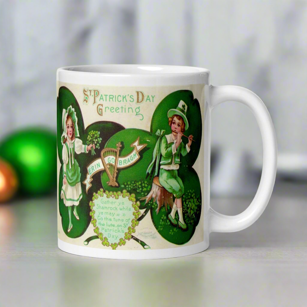 This glossy coffee mug features a retro illustration that says St. Patrick's Day Erin Go Bragh, alongside a festive Irish blessing:
"Gather ya Shamrock while ye may, Go to the tune of the lute on St. Patrick’s Day."